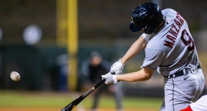 Kyle Manzardo swings at a pitch while representing the Cleveland Guardians in the Arizona Fall League.